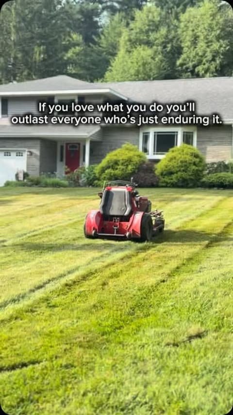 Zero-turn mower striping a front lawn